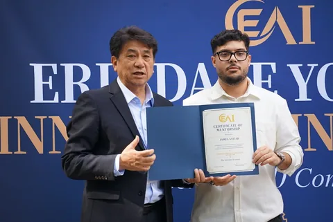 A mentor certificate presentation at the launch celebration.